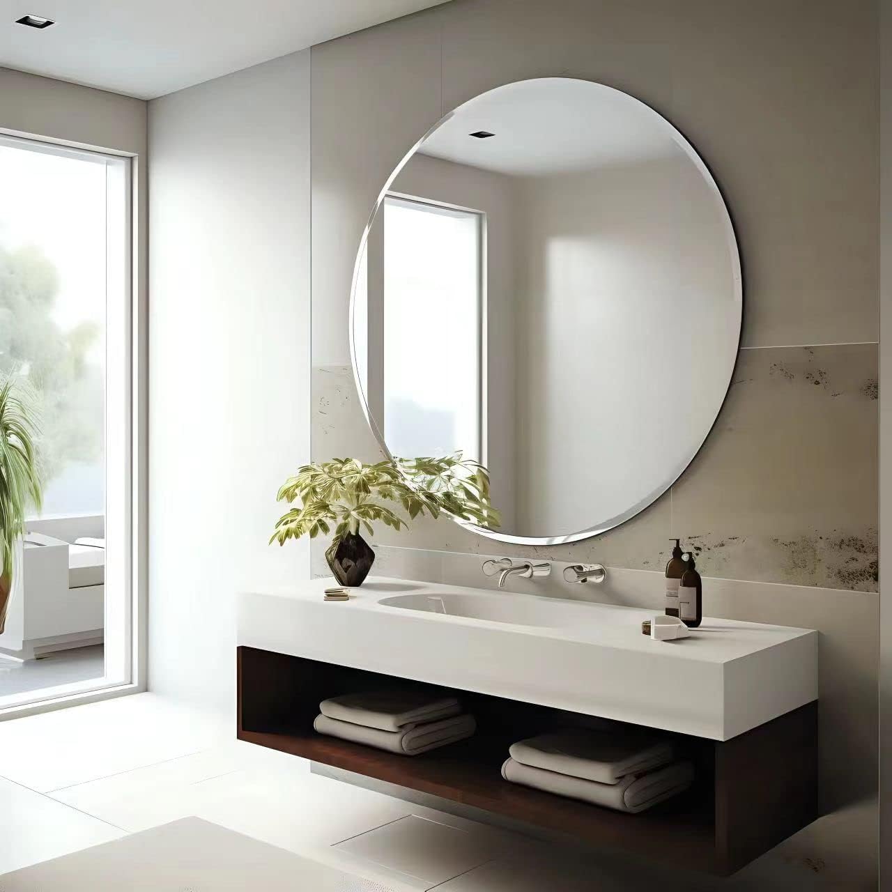 frameless round wall mirror above bathroom vanity with open wood shelf and chrome faucet