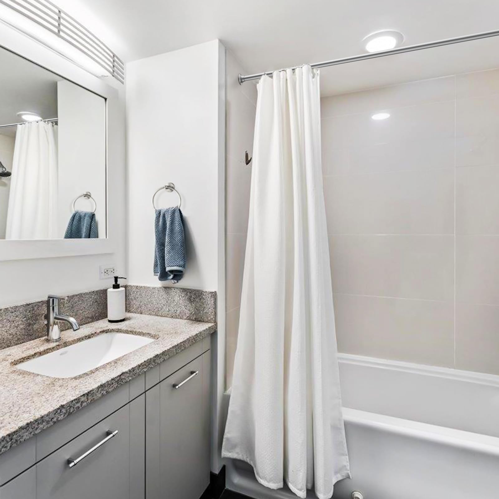 USHOWER Matuko Series – Brushed Nickel Shower Curtain Rod Installed in Bathroom Over Bathtub with White Curtain Beside Vanity