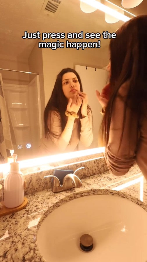 LED bathroom mirror with adjustable light for skincare, makeup, and grooming